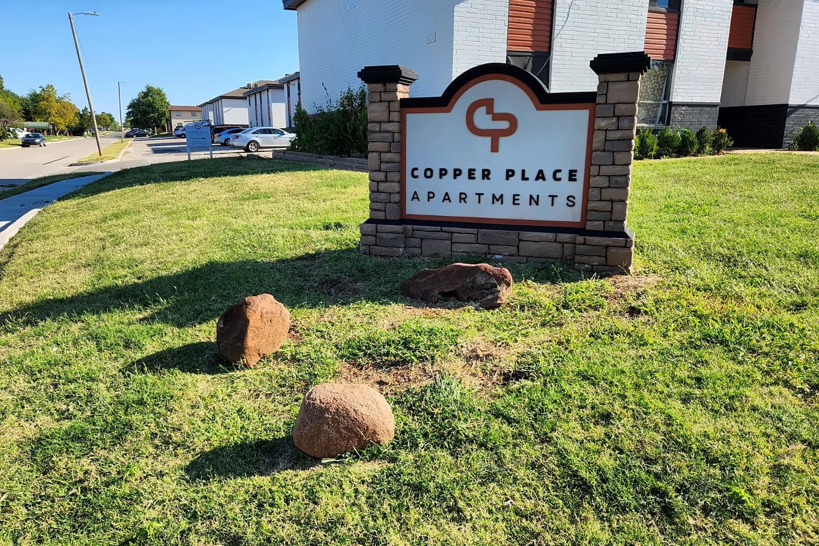 Copper Place Apartments sign and lawn