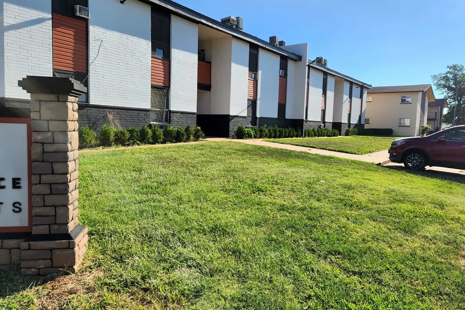 Front of Copper Place Apartments with community sign